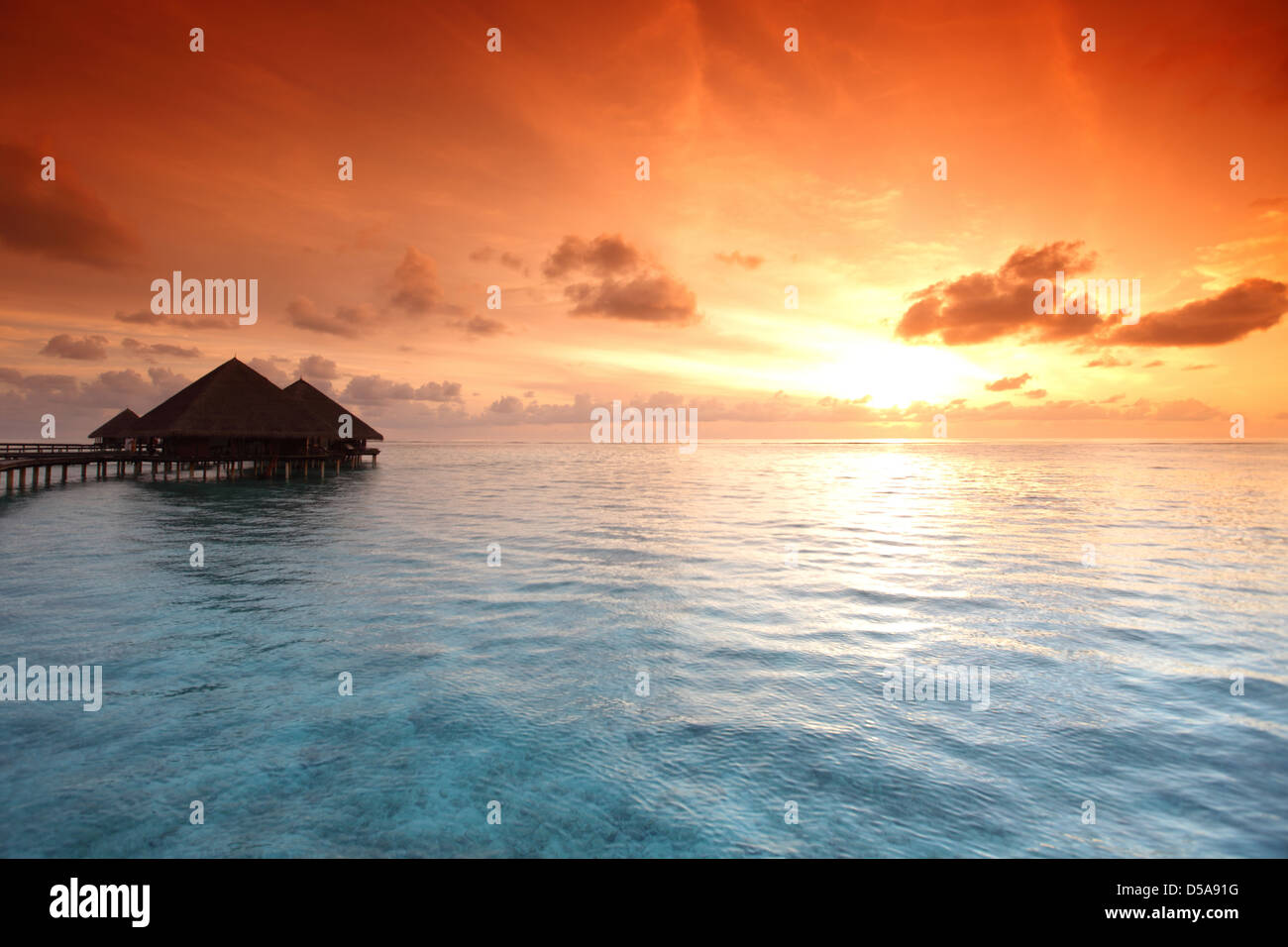 resort maldivian houses on sunrise Stock Photo - Alamy