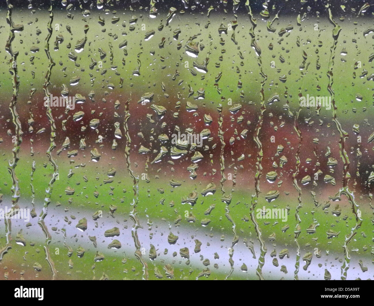 Raindrops rain drops rain on a window Stock Photo