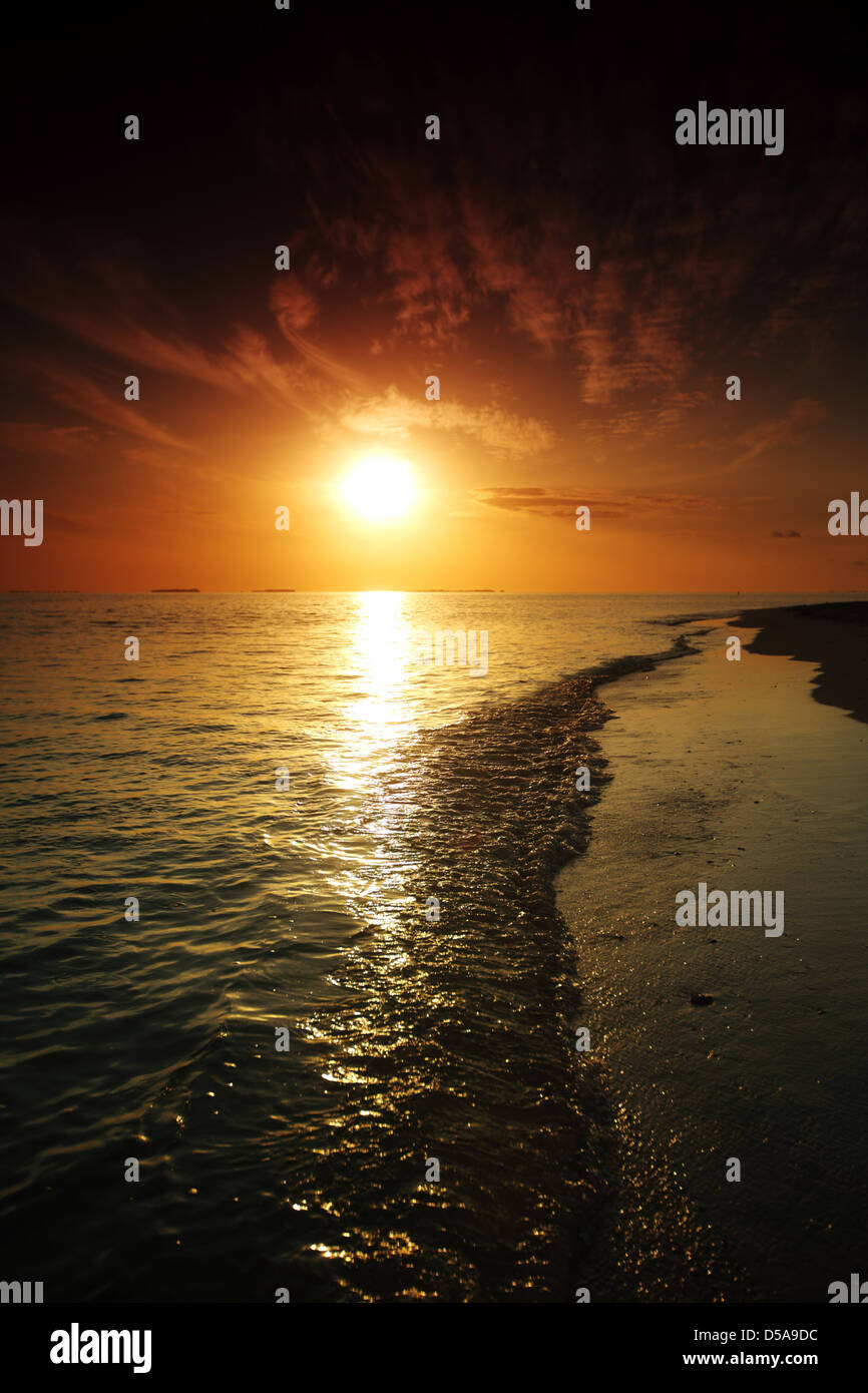sunset on the sea beach Stock Photo - Alamy