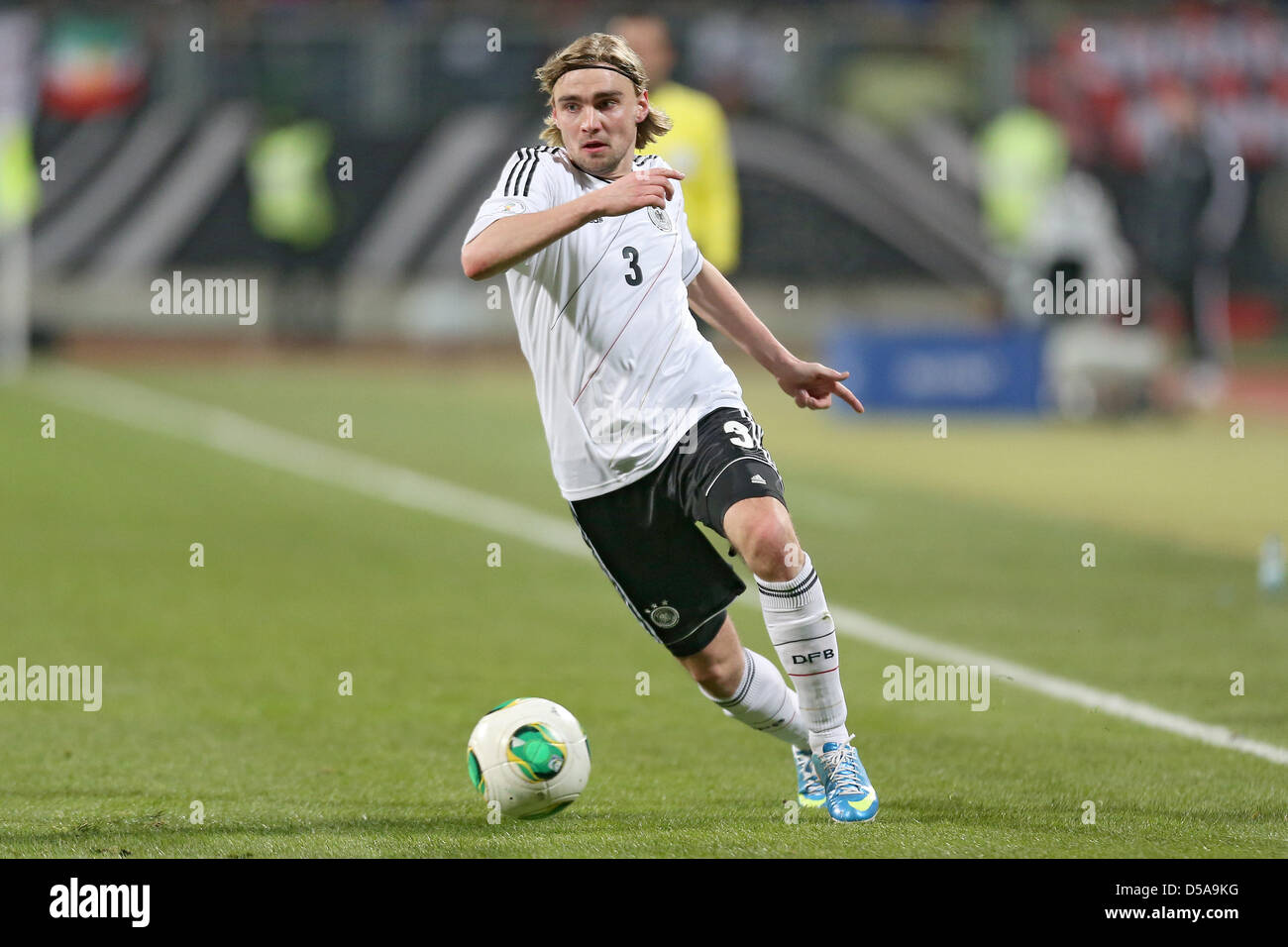 Germany's Marcel Schmelzer plays the ball during the FIFA World Cup 2014 qualification group C soccer match between Germany and Kazakhstan at Nuernberg Arena in Nuremberg, Germany, 26 March 2013. Photo: Daniel Karmann/dpa Stock Photo