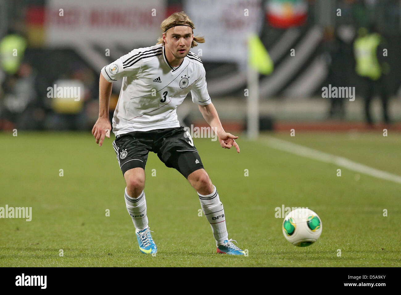 Germany's Marcel Schmelzer plays the ball during the FIFA World Cup 2014 qualification group C soccer match between Germany and Kazakhstan at Nuernberg Arena in Nuremberg, Germany, 26 March 2013. Photo: Daniel Karmann/dpa Stock Photo
