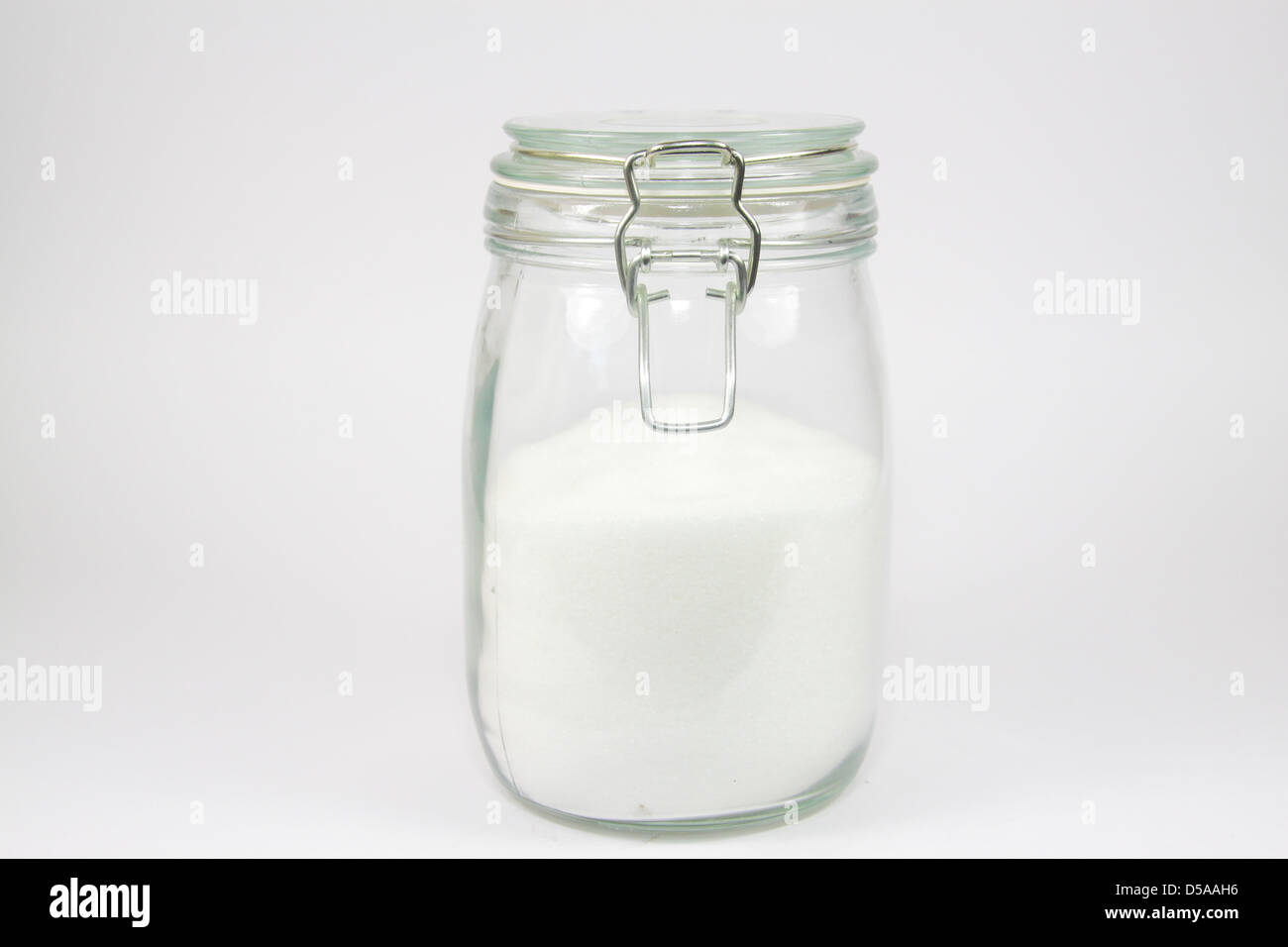 Glass storage jar of sugar Stock Photo Alamy