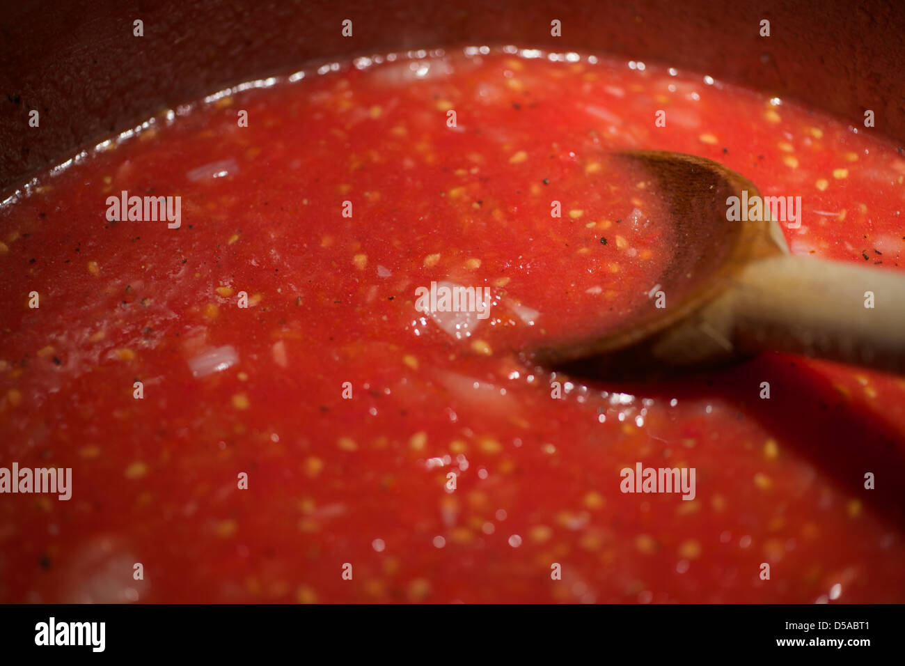 Simmering tomato sauce. Stock Photo