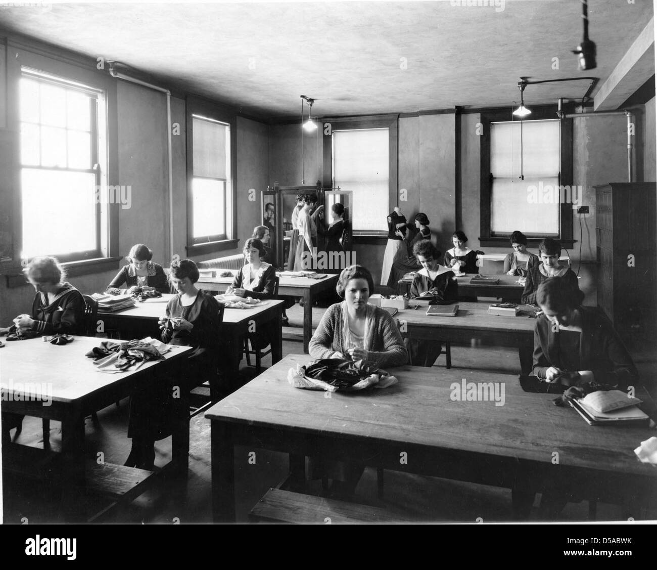 Clothing laboratory in home economics building, about 1918. Photo used in ''Home Economics at