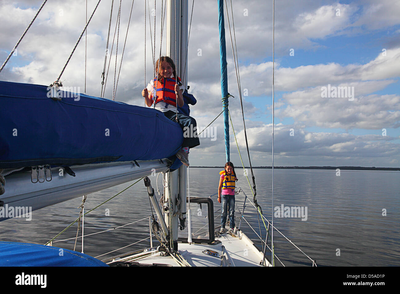 Kids Sailing on a lake in Ireland Stock Photo