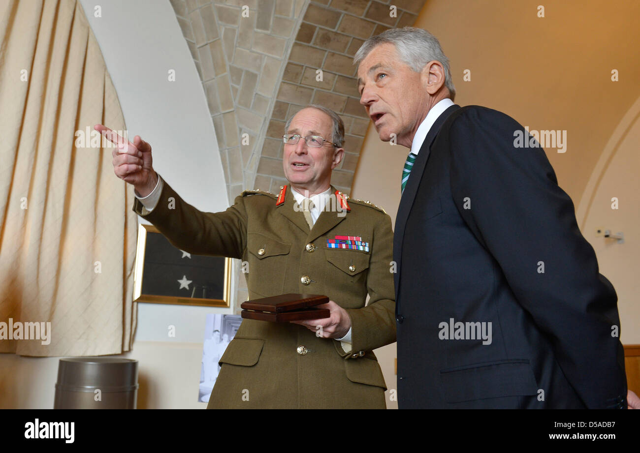 US Secretary of Defense Chuck Hagel meets with British Chief of the Defence Staff General David Richards and senior military chiefs from the United Kingdom at the National Defense University at Fort McNair March 27, 2013 in Washington, DC. This is the first meeting of its kind since 1948 and was called to discuss strategic challenges the UK and US militaries may face together in the future. Stock Photo