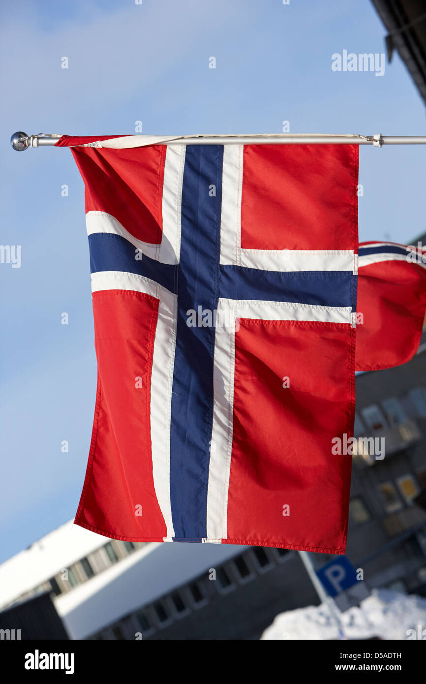 norwegian flags flying in kirkenes finnmark norway europe Stock Photo