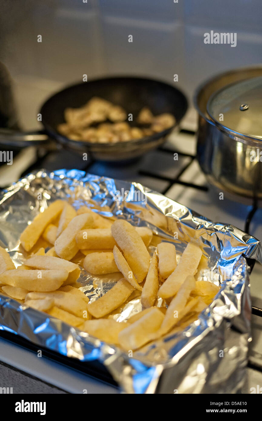 oven chips ready to be put into the oven for a uk evening meal Stock