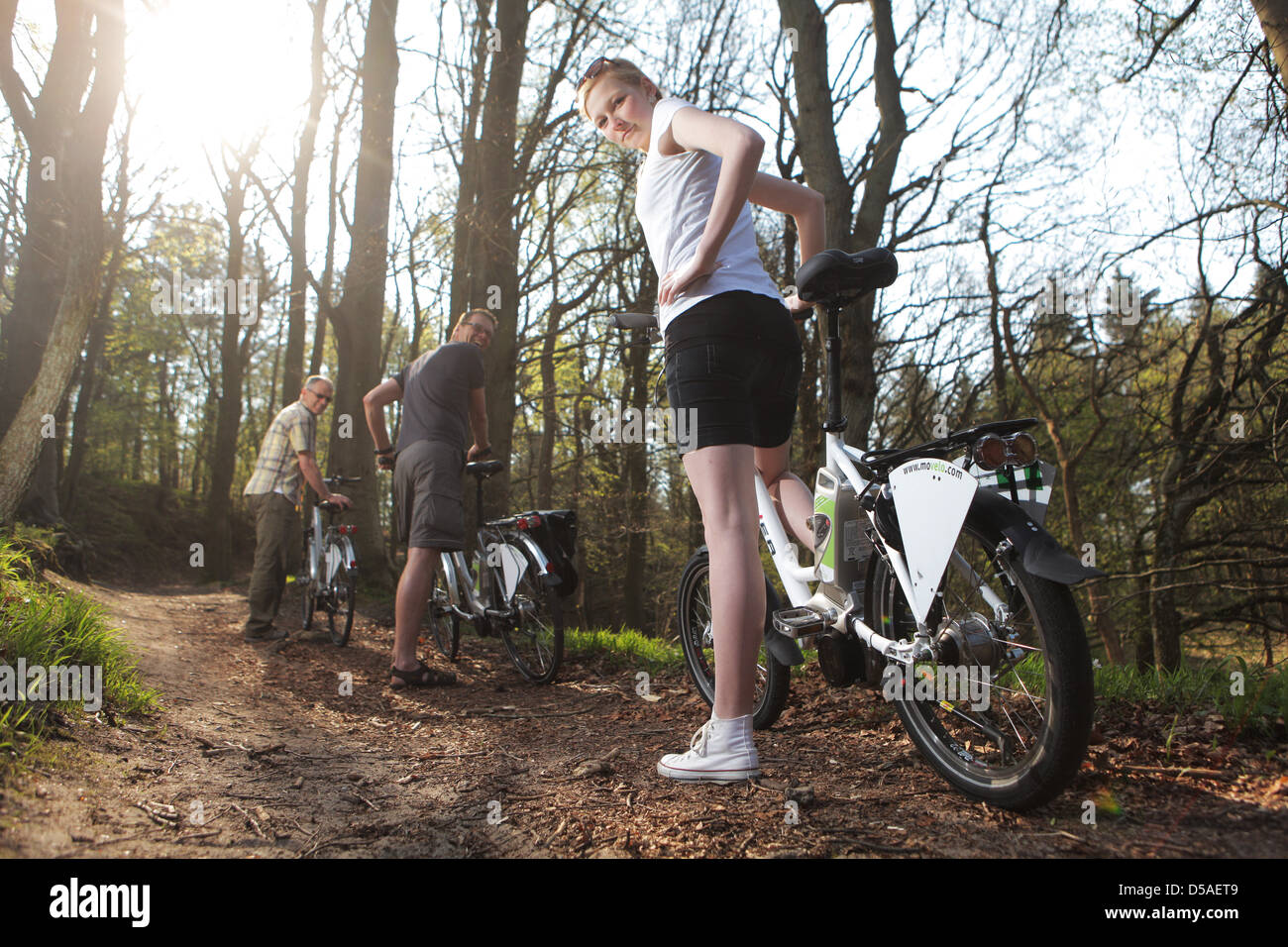 Oeversee, Germany, bikers on a forest road in the mountains with Froeruper electric bicycles of the Flyers series Biketec AG Stock Photo