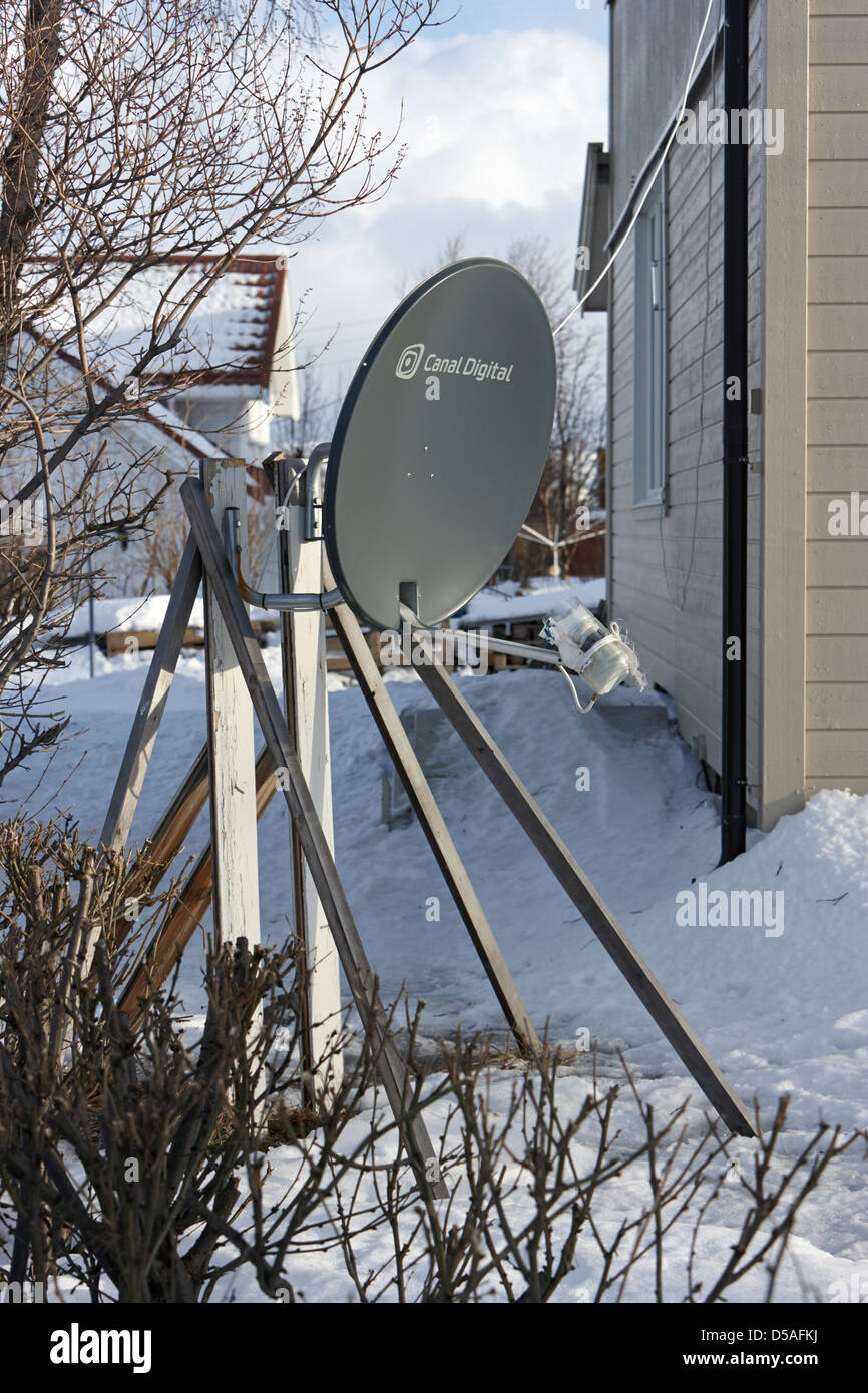 canal digital low angle satellite television dish receiver on tripod kirkenes finnmark norway europe Stock Photo