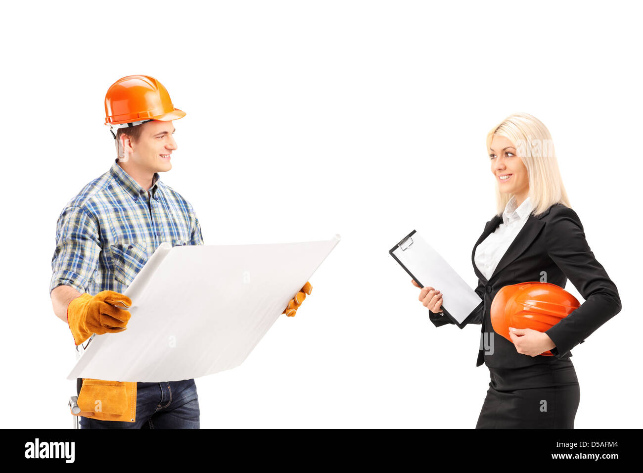 Male engineer holding a blueprint and discuss with female architect isolated on white background Stock Photo