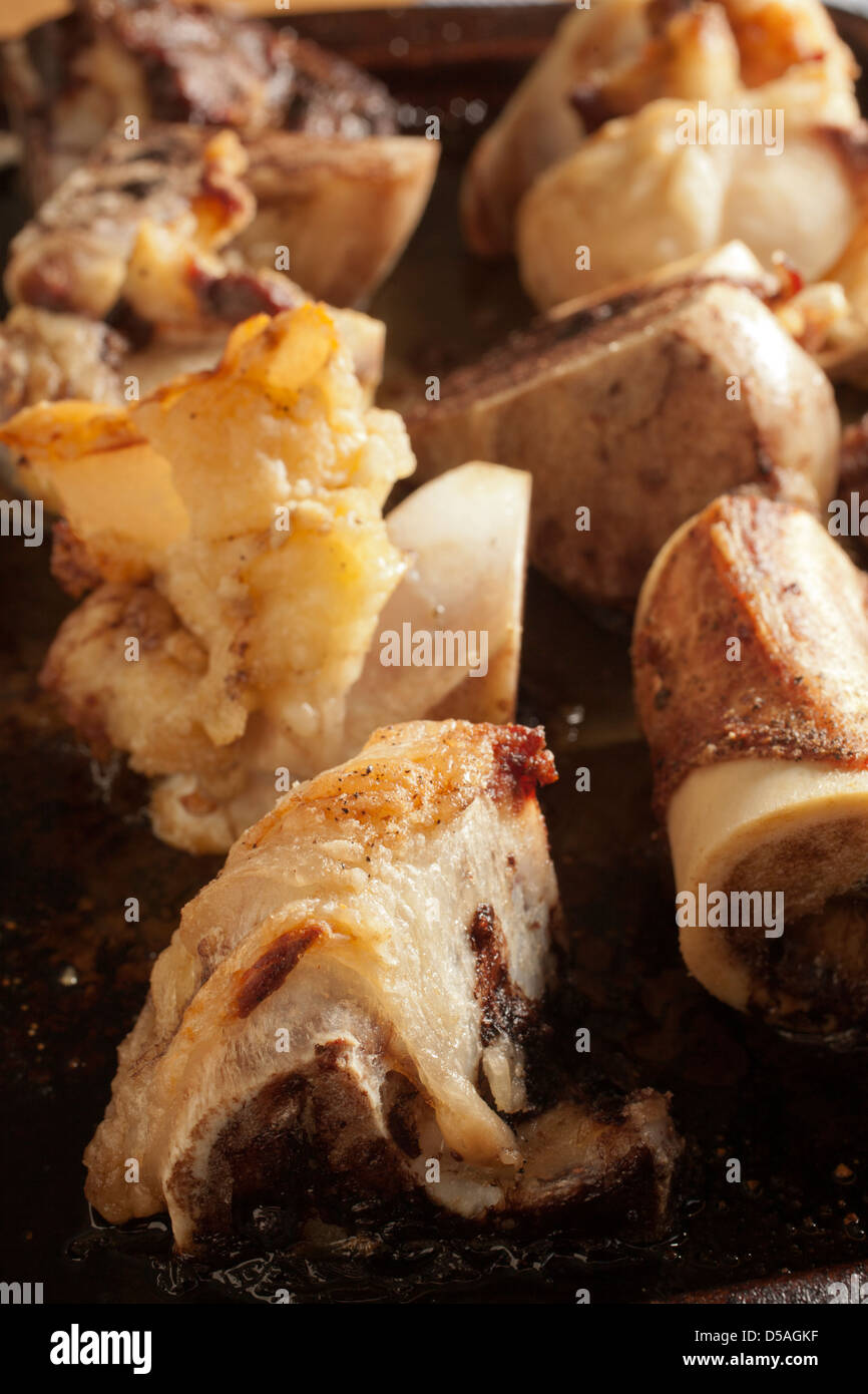 Beef bones roasting for stock Stock Photo Alamy