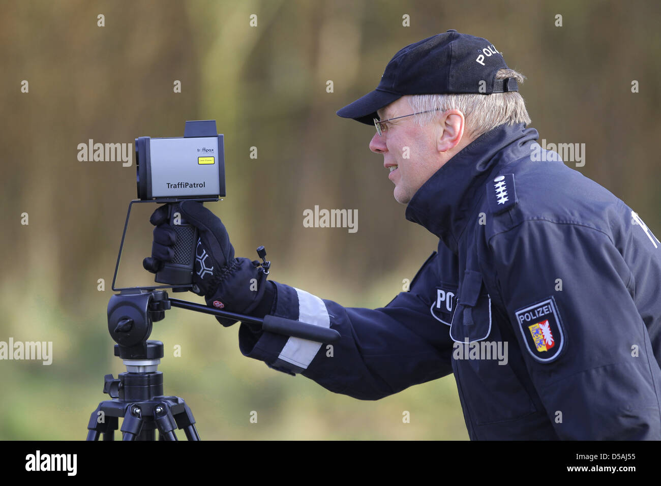 Flensburg, Germany, speed control using laser measuring device Stock Photo  - Alamy