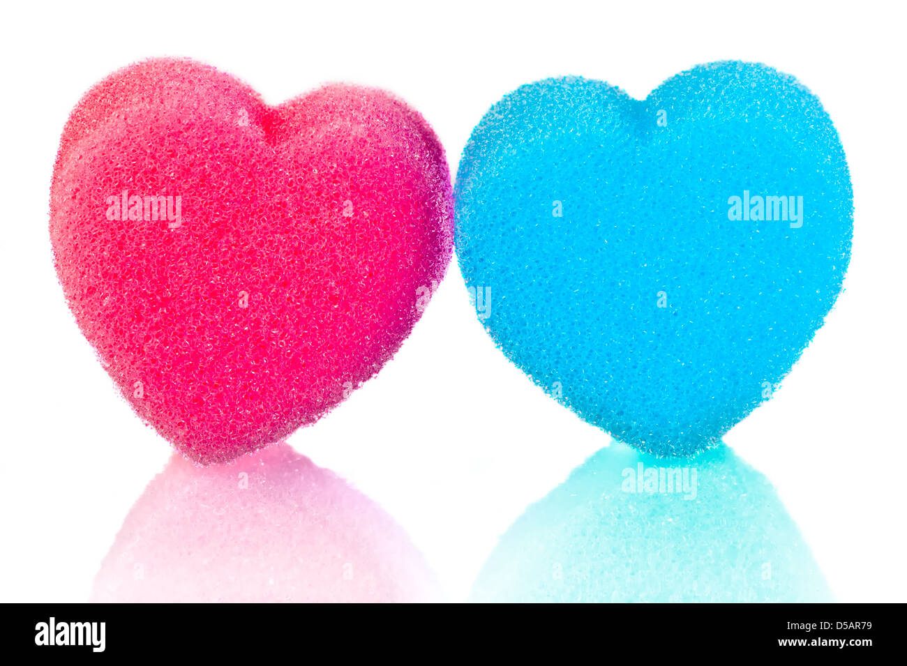Two hearts of blue and pink lips on a white background Stock Photo
