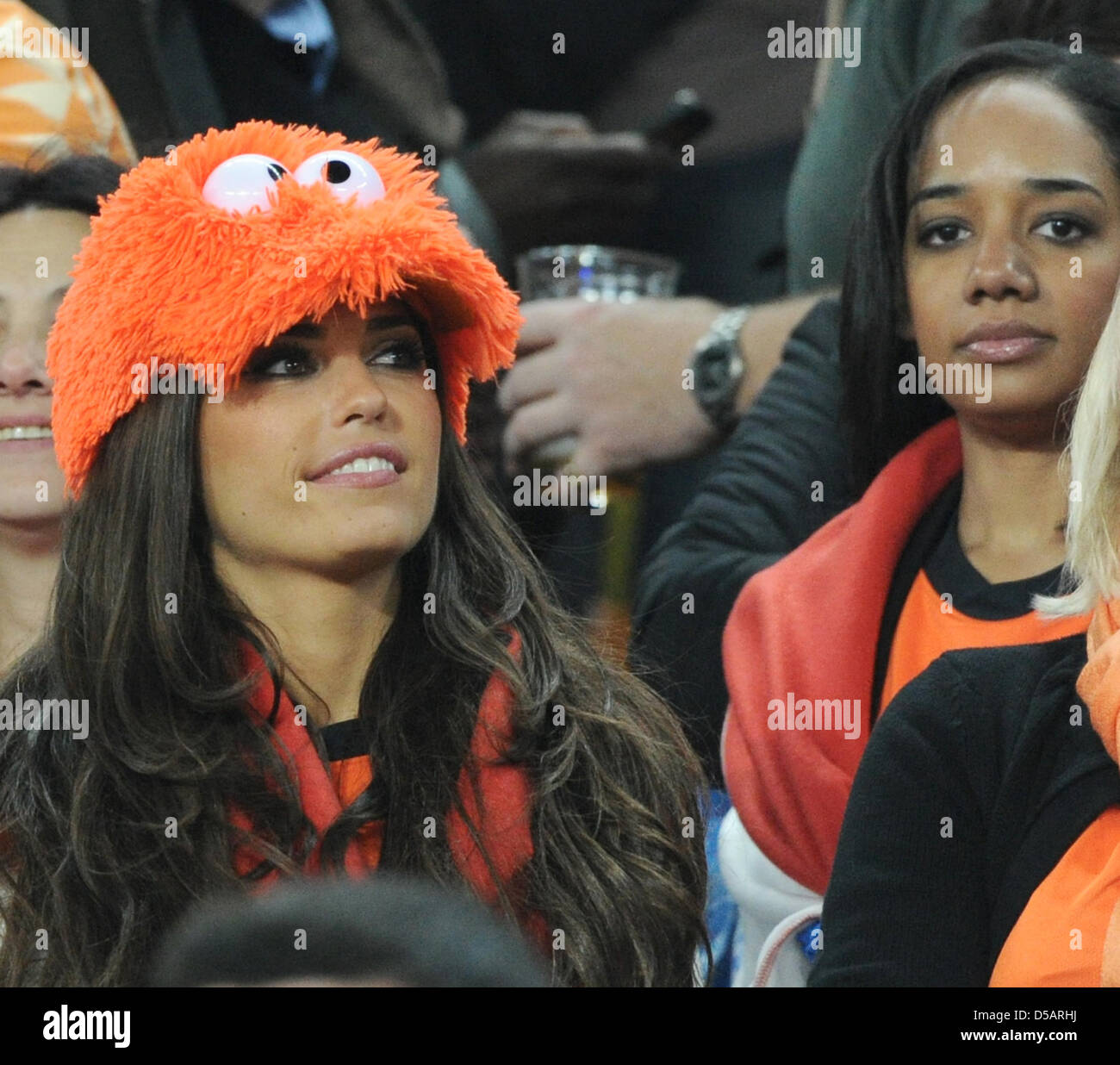 Yolanthe Cabau van Kasbergen (L), girlfriend of Dutch player Wesley Sneijder on the stand prior to the 2010 FIFA World Cup final match between the Netherlands and Spain at Soccer City Stadium in Johannesburg, South Africa 11 July 2010. Photo: Marcus Brandt dpa - Please refer to http://dpaq.de/FIFA-WM2010-TC Stock Photo