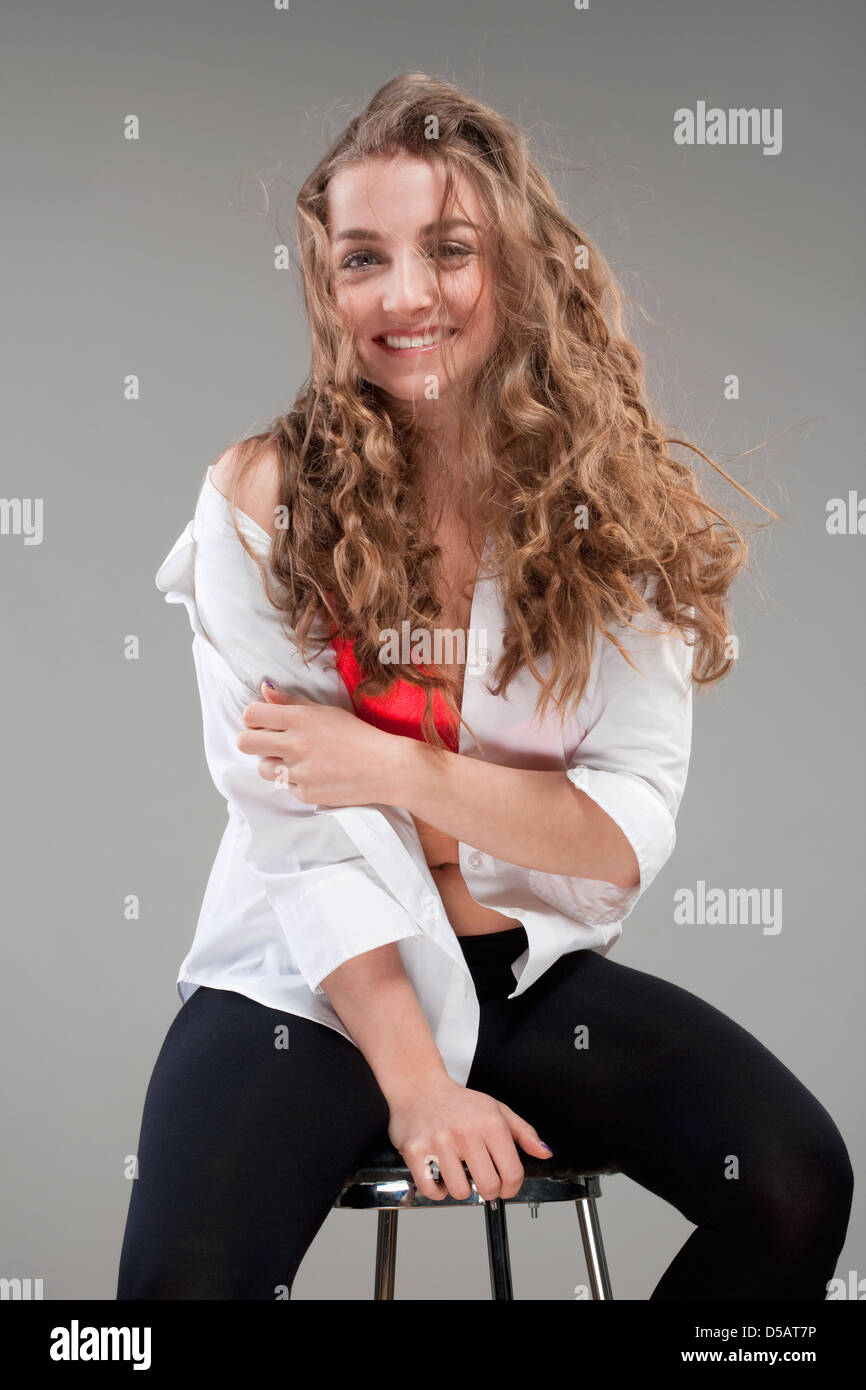 portrait of a young beautiful woman with brown hair smiling - isolated ...