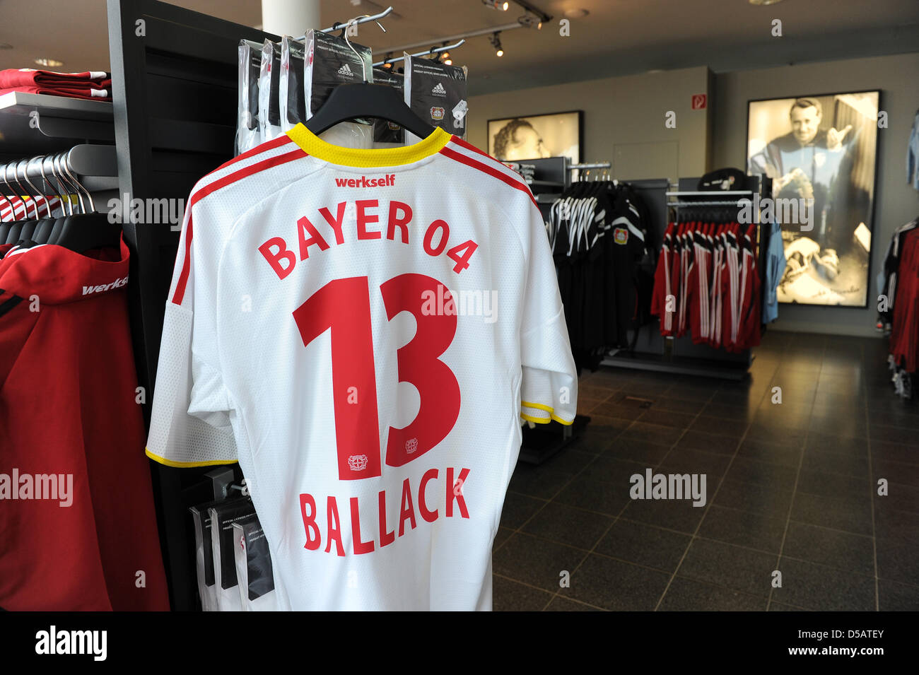 The jersey of the former and newly returned player of Bayer Leverkusen,  Michael Ballack, hangs in a fan shop during the presentation of the  national team player in Leverkusen, Germany, 14 July
