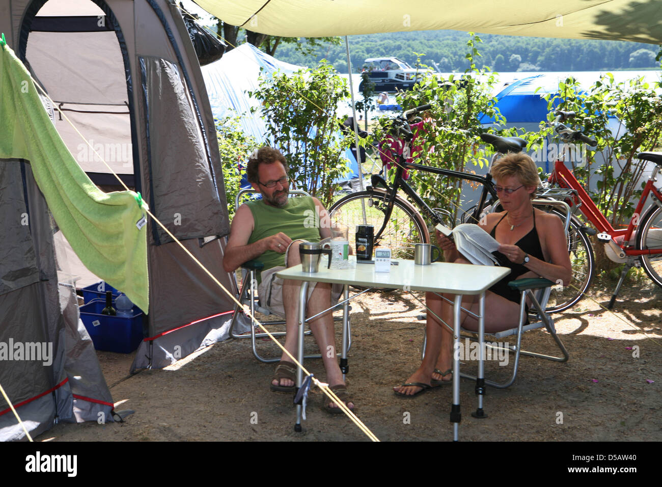 A Dutch couple enjoys their vacation on Sanscoussi campsite in Potsdam, Germany, 16 July 2010