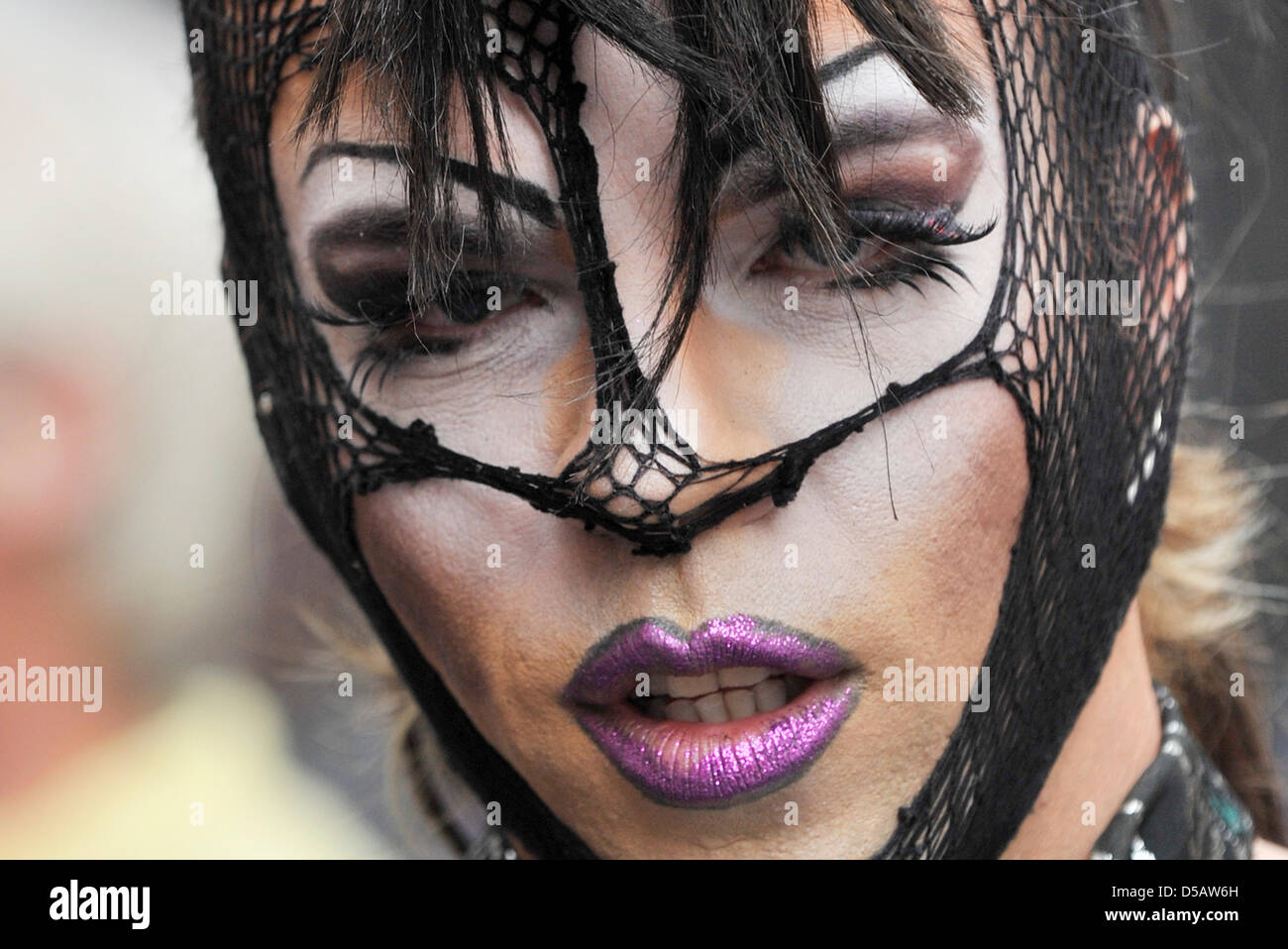 Dressed-up people party at the Christopher Street Day (CSD) in Frankfurt Main, Germany, 17 July 2010. The CSD is held in memory of the first big uprising of homosexuals against police assaults that took place in New York's Christopher Street in Greenwich Village on 28 June 1969. Photo: BORIS ROESSLER Stock Photo