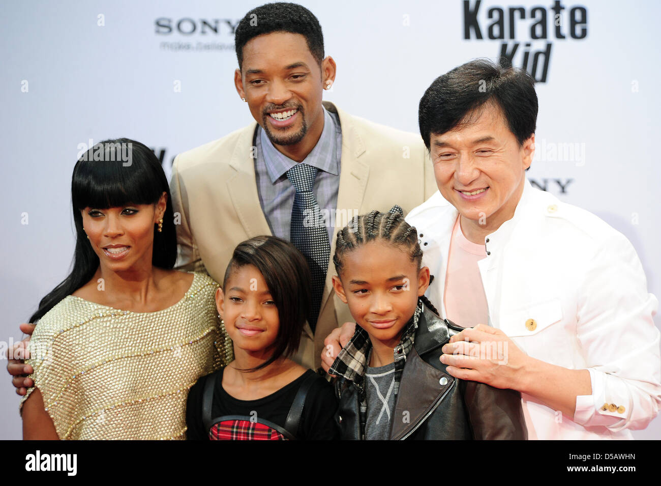 American actor Will Smith (back), his wife Jada Pinkett (front L-R), his daughter Willow, son Jaden and Hong Kong-born actor Jackie Chan pose on the red carpet at the premier of 'Karate Kid' in Berlin, Germany, 19 July 2010. The film will be shown in German cinemas starting 22 July 2010. Photo: Hannibal Hanschke Stock Photo