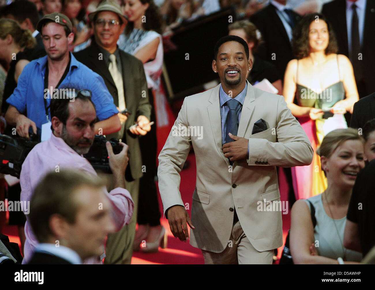 American actor Will Smith walks across the red carpet at the premier of 'Karate Kid' in Berlin, Germany, 19 July 2010. The film will be shown in German cinemas starting 22 July 2010. Photo: Hannibal Hanschke Stock Photo