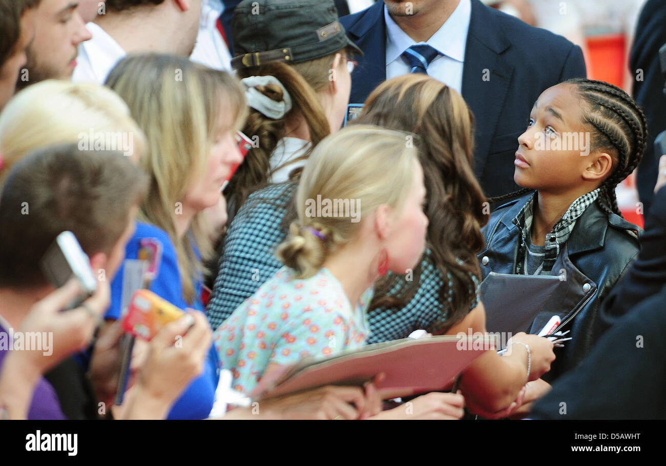 Jaden Smith (R), son of actor Will Smith, signs autographs on the red carpet at the premier of 'Karate Kid' in Berlin, Germany, 19 July 2010. The film will be shown in German cinemas starting 22 July 2010. Photo: Hannibal Hanschke Stock Photo