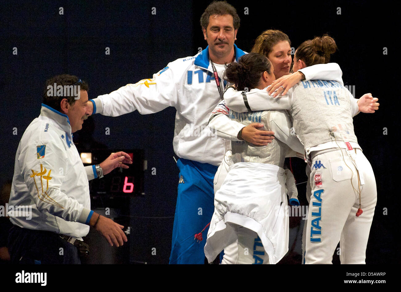 Floret Fencers Ilaria Salvatori Arianna Errigo And Elisa Di Francisca Hug And Stand Next To The Italian Coaches Giulio Tomassini And Stefano Cerioni L R After The Team Final Of The European Fencing