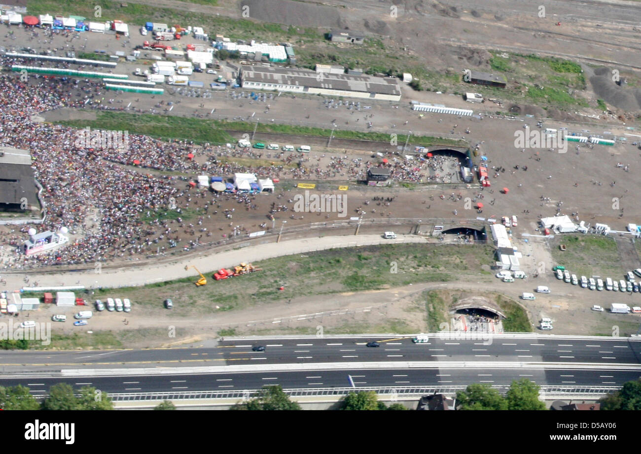 An aerial view of the entrance to the festival grounds, captured before the mass panic that cost 19 lives at the Love Parade in Duisburg, Germany, 24 July 2010. At least 340 people have been injured in the mass panic. An estimated million people visited the techno music festival which will probably not be held again. The city and the organizers now face harsh criticism and scrutiny Stock Photo