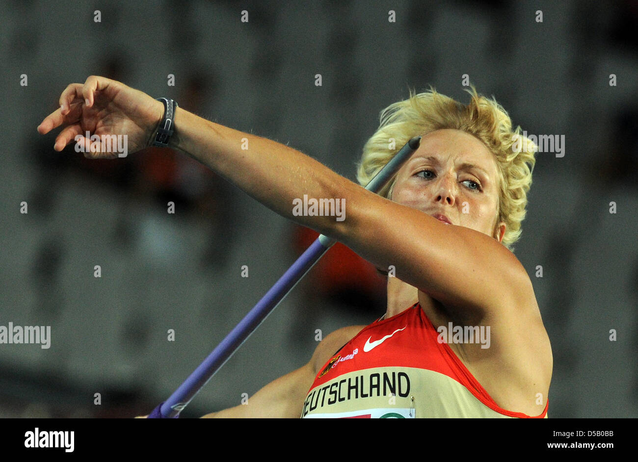 German javelin thrower Christina Obergföll throws her javelin at the Olympic stadium Lluis