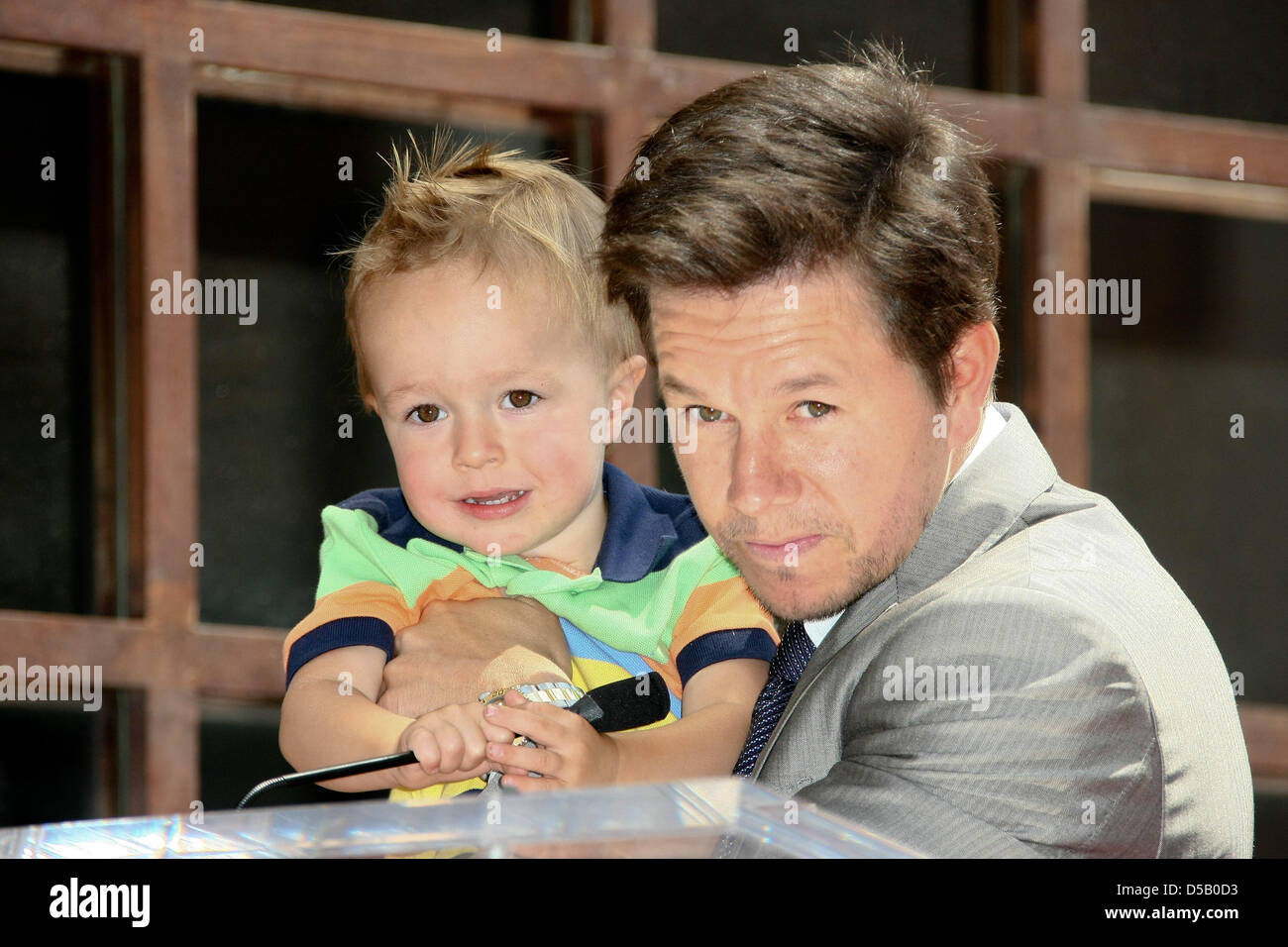 US actor Mark Wahlberg presents his new star on the Hollywood Walk of Fame with his son Brendan in Los Angeles, USA, July 29, 2010. Photo: Hubert Boesl Stock Photo