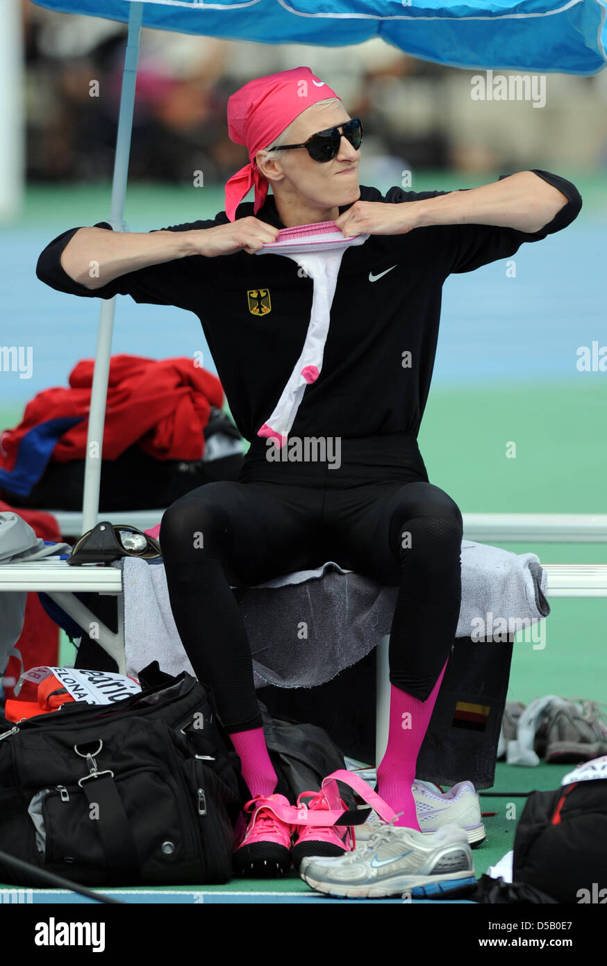German high jumper Ariane Friedrich stretches out a sock at the Olympic