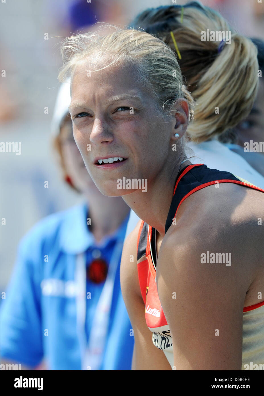 German heptathlete Jennifer Oeser watches the proceedings at the Olympic stadium Lluis Companys during the European Athletics Championships in Barcelona, Spain, 30 July 2010. Photo: Rainer Jensen Stock Photo