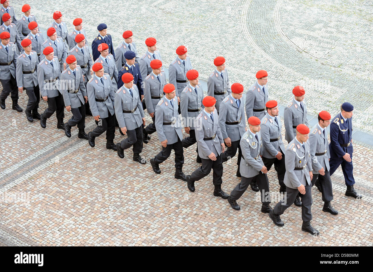 Some 650 German Bundeswehr recruits stand attention during their public ...