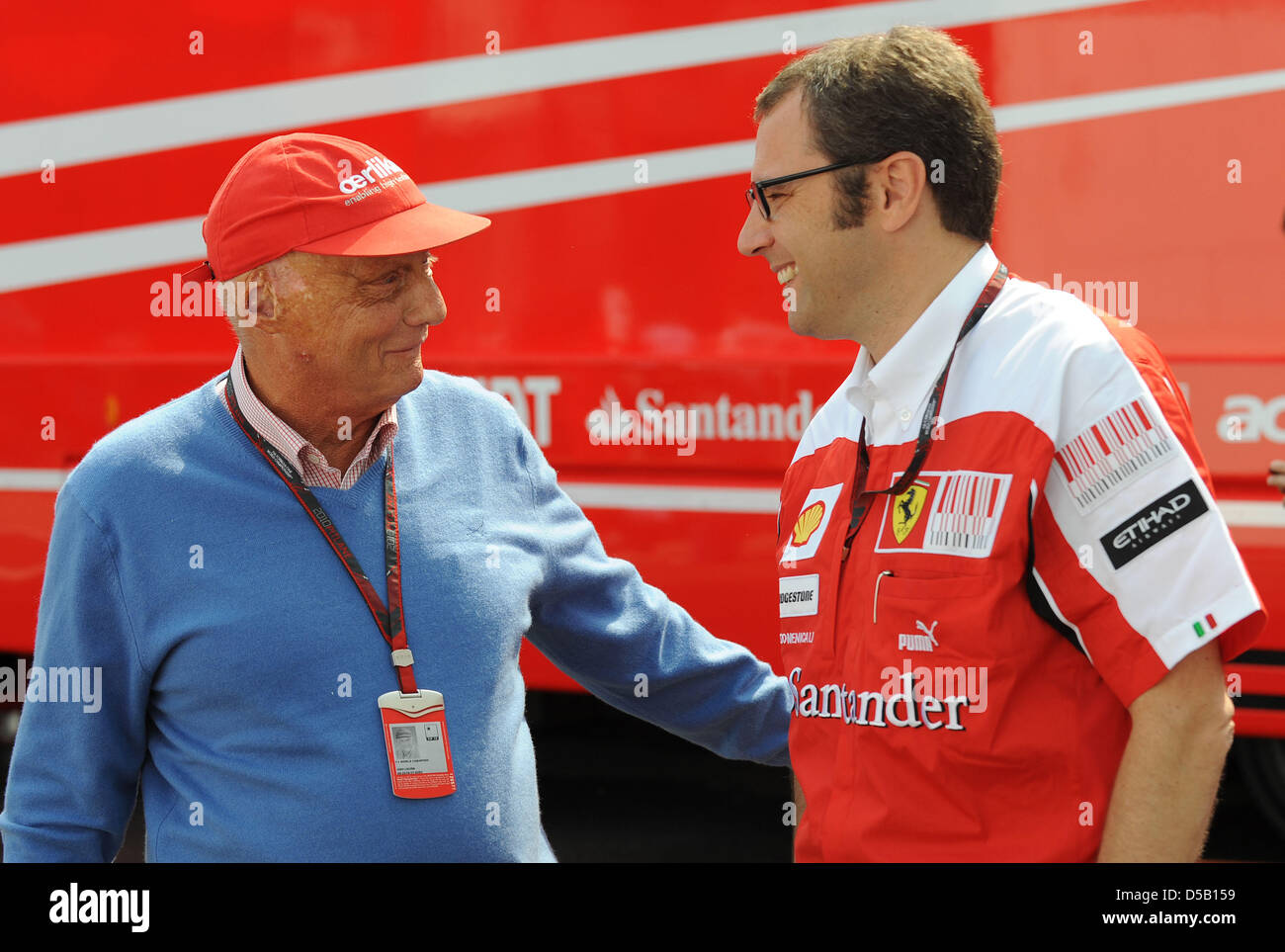 Former driver Niki Lauda and Ferrari principal Stefano Domenicali ...