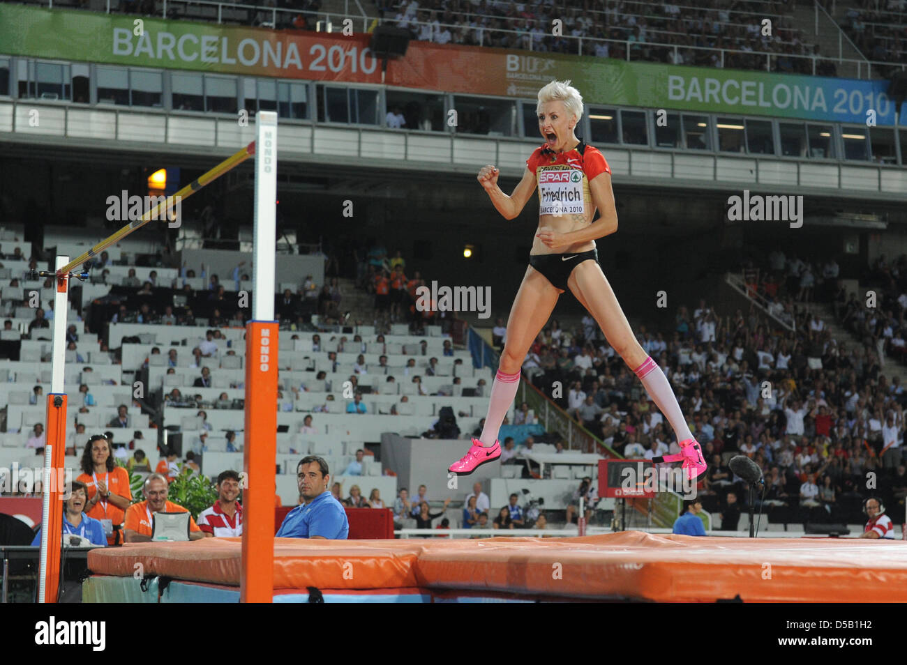 German high jumper Ariane Friedrich leaps up in joy after winning the bronze medal in the women's high jump competition at the European Athletics Championships in Barcelona, Spain, 01 August 2010. Photo: Rainer Jensen Stock Photo