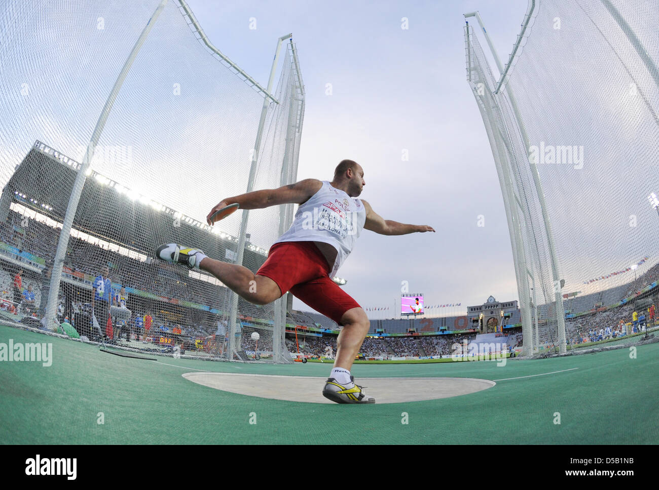 Polish discus thrower Piotr Malachowski throws at the European Athletics Championships in