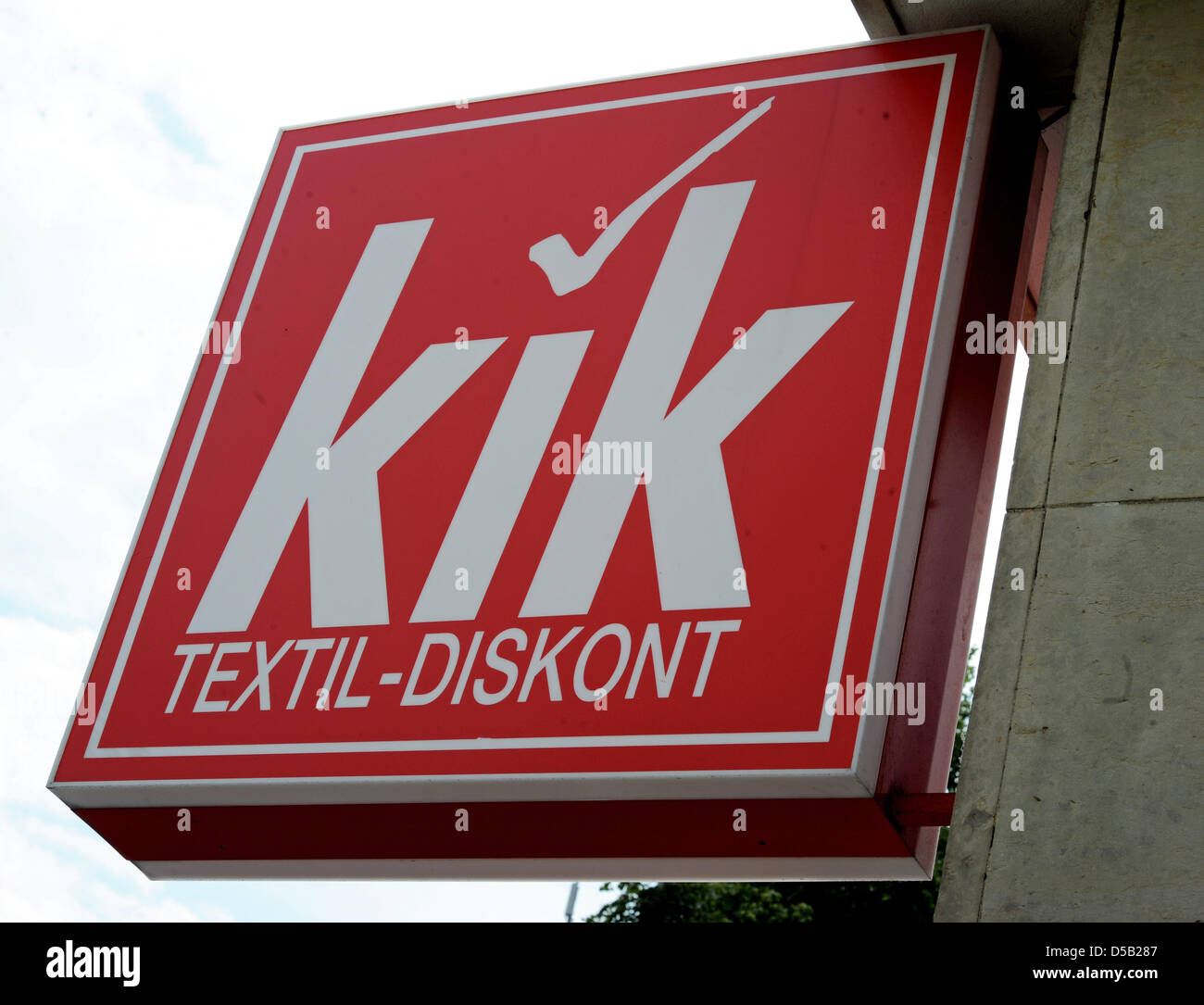 The company's logo hangs at the store front of a KiK textile company chain  store in Hamburg, Germany, 2 August 2010. On 4 August, the German channel  ARD will broadcast a report