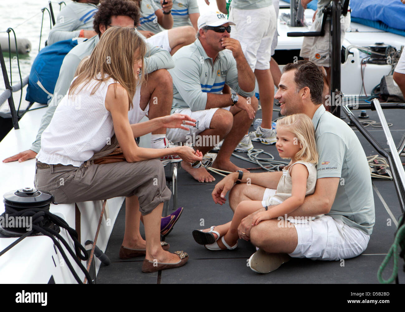 Crown Princess Letizia and their doughter Princess Sofia pick up Spanish Crown Prince Felipe on the second Day of the 29th edition of the King's Cup ( Copa del Rey) sailing race in Mallorca, Spain. Photo copyright: Nico Martinez / Copa del Rey Photo: Albert Nieboer / Royal Press Europe Stock Photo