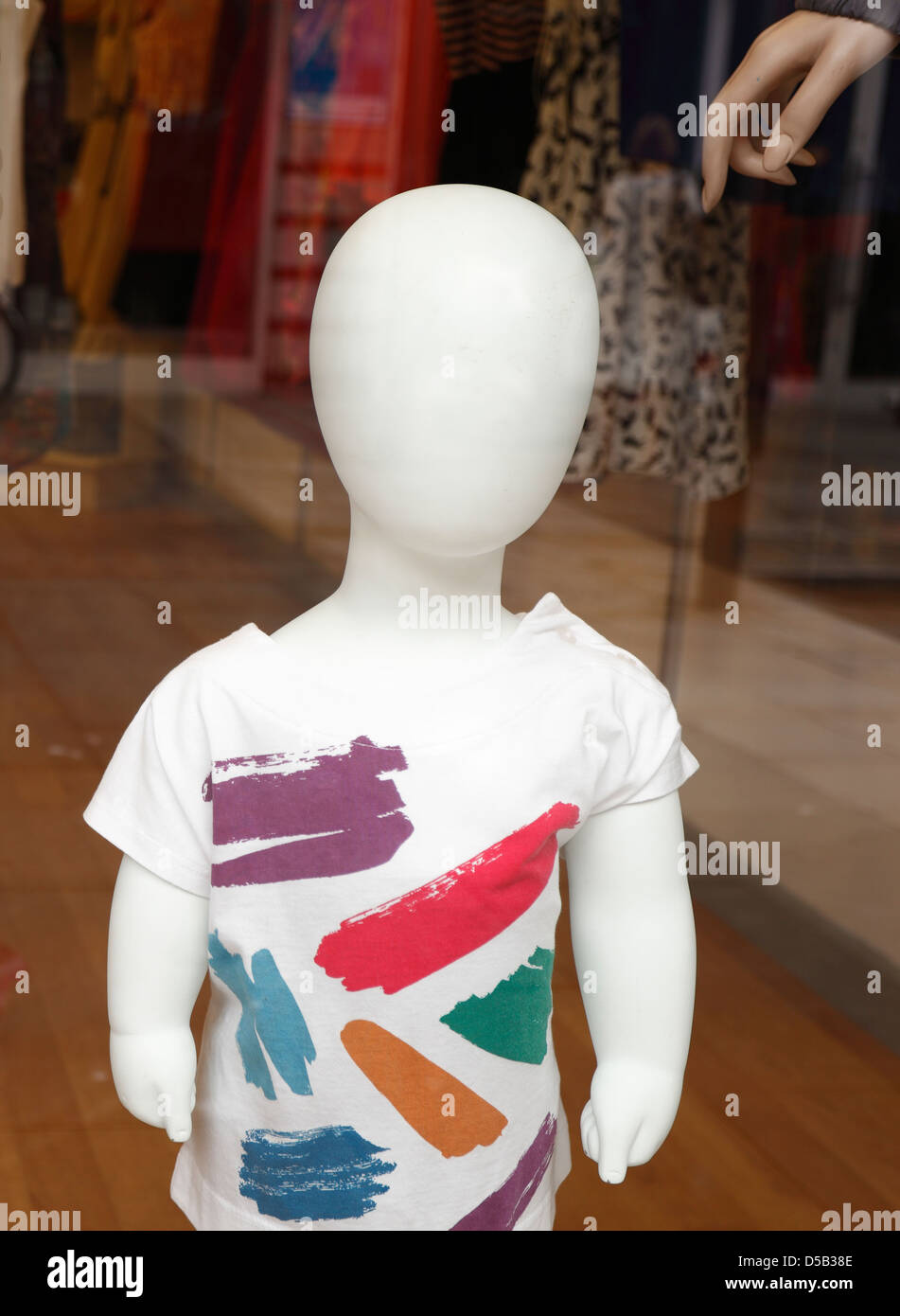 Boy child mannequin in a shop window Stock Photo Alamy