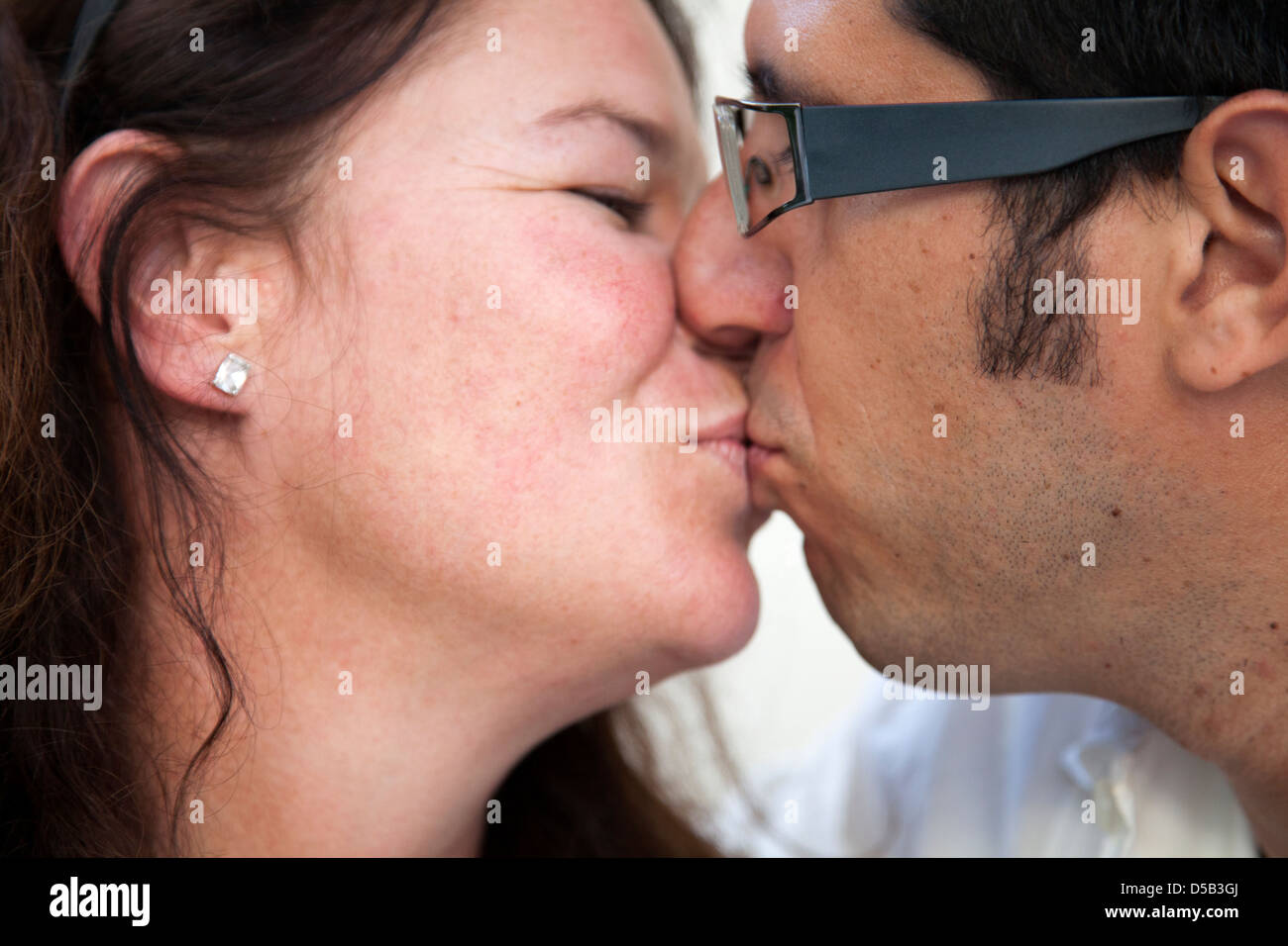 Close-up passionate kiss symbolizing intense desire