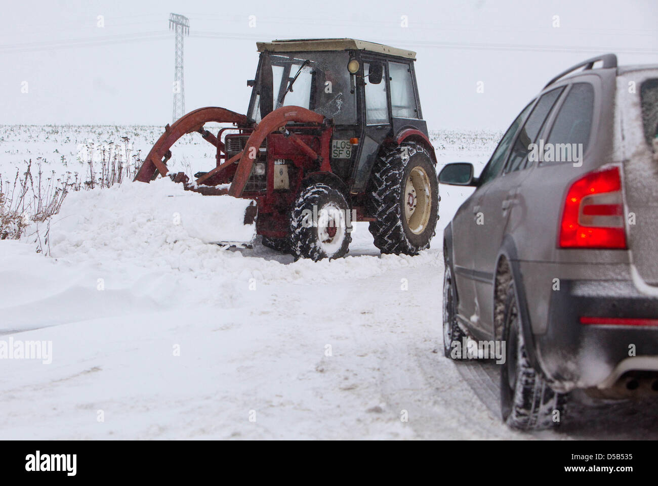 A tractor clears the road of snow near Pillgram, Germany, 09 January ...