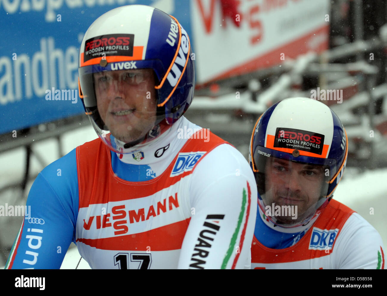 Italians Christian Oberstolz and Patrick Gruber finish the second run ...