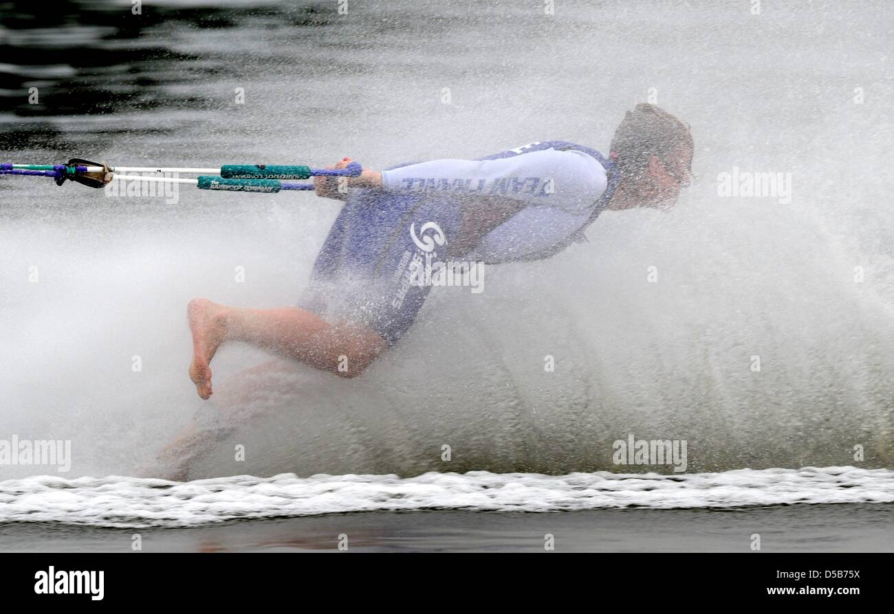 French athlete Alexadra Vigoureux shows her skill in a trial run at the 17th barefoot waterski world cup in Brandenburg, Germany, 08 August 2010. 150 athletes from 20 countries participate in the event that will last until 15 August 2010. 15,000 to 20,000 spectators are expected. Photo: RAINER JENSEN Stock Photo