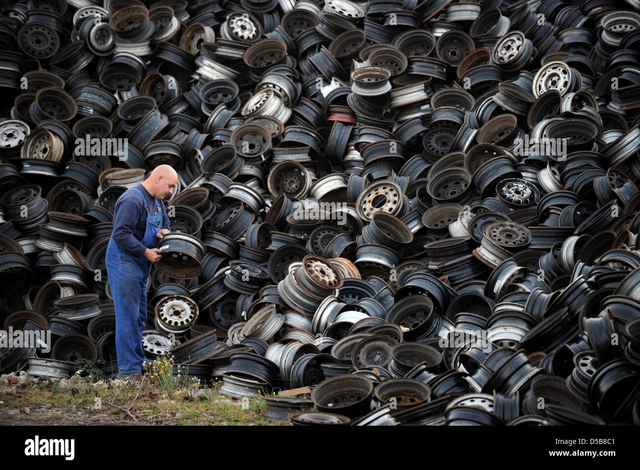Krostitz, Germany, old steel wheels in a junkyard Stock Photo