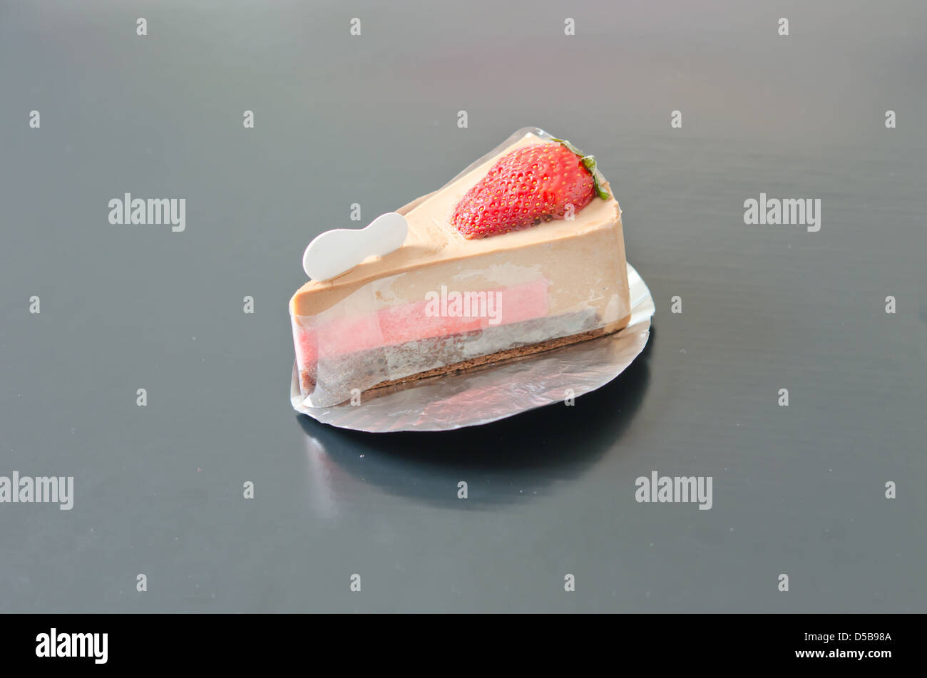 slices of strawberry cheesecake , sweet dessert Stock Photo