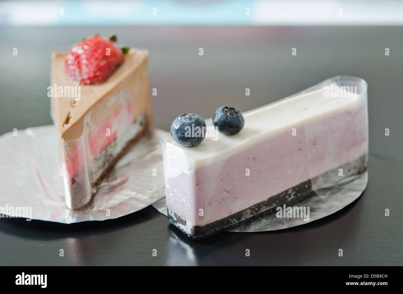 blueberries cheesecake and strawberry cheesecake , delicious and sweet Stock Photo