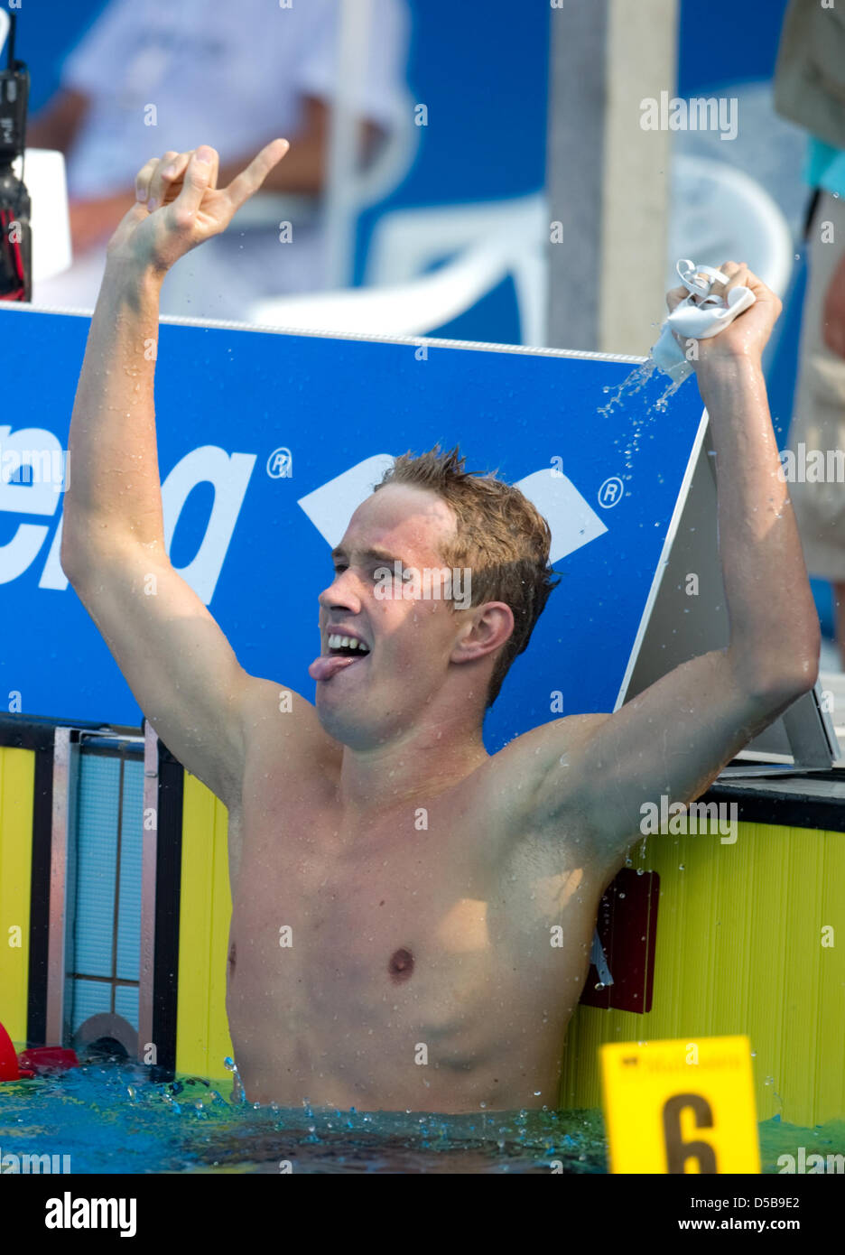 French swimmer Sebastien Rouault (R) celebrates his gold medal in the ...