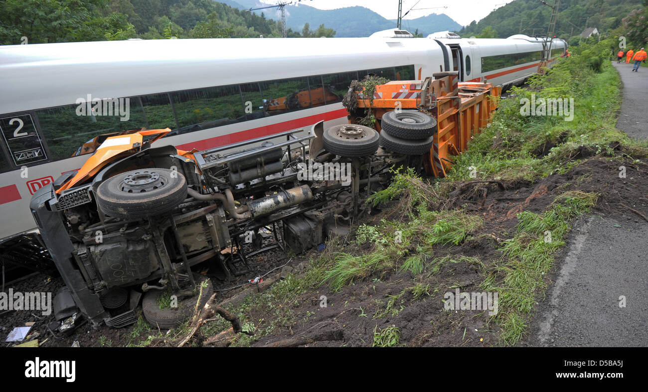 A dust car lies on the side after crashing with an ICE highspeed train in Lambrecht, Germany, 17 August 2010. Nine people were injured, two of them severly. Photo: Ronald Wittek Stock Photo