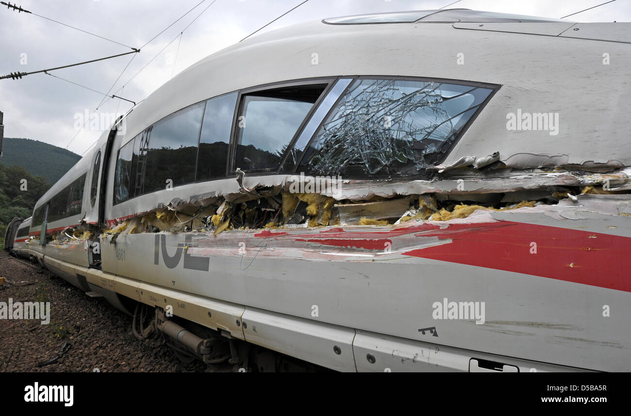 A dust car lies on the side after crashing with an ICE highspeed train in Lambrecht, Germany, 17 August 2010. Nine people were injured, two of them severly. Photo: RONALD WITTEK Stock Photo