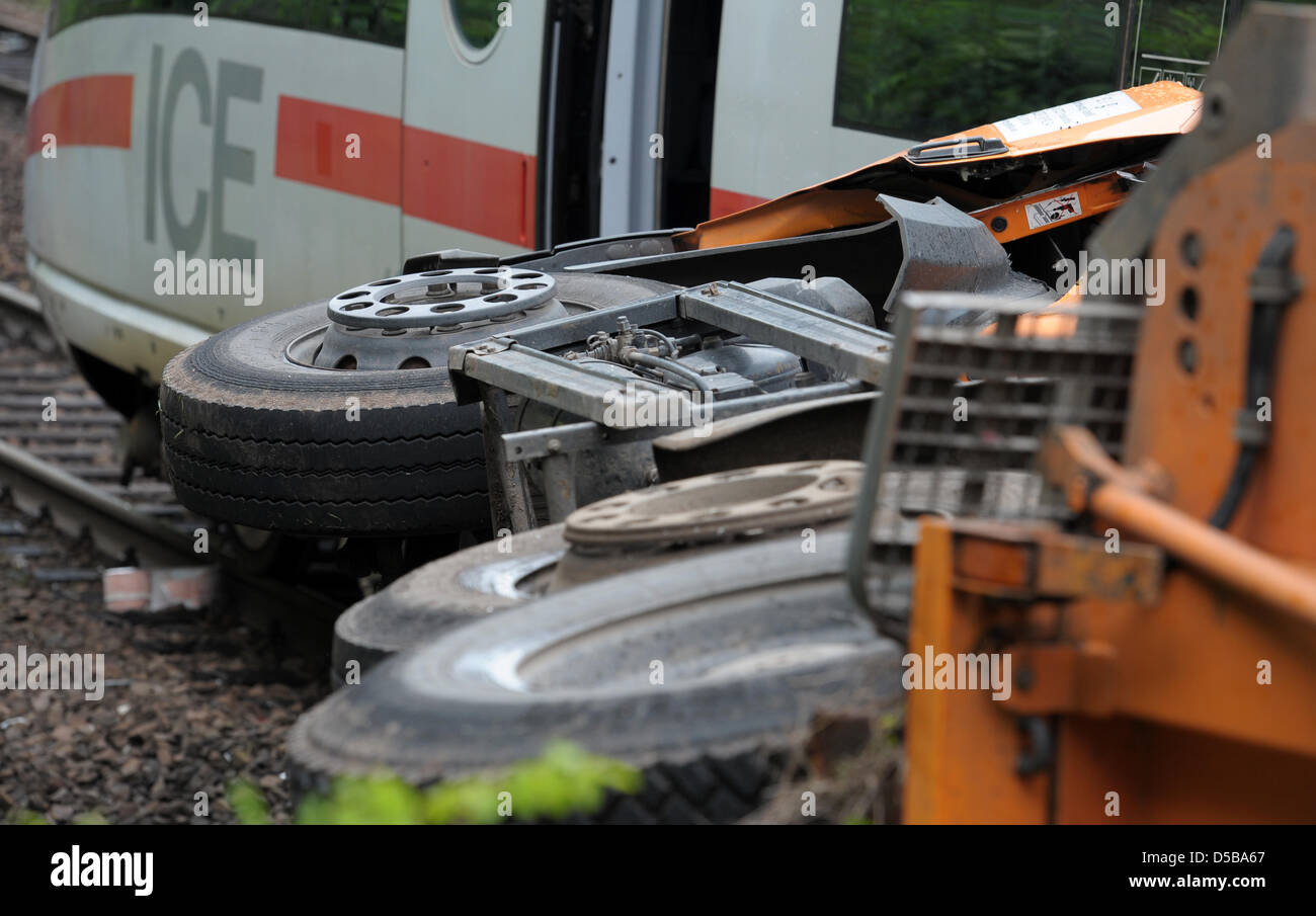 A dust car lies on the side after crashing with an ICE highspeed train in Lambrecht, Germany, 17 August 2010. Nine people were injured, two of them severly. Photo: RONALD WITTEK Stock Photo